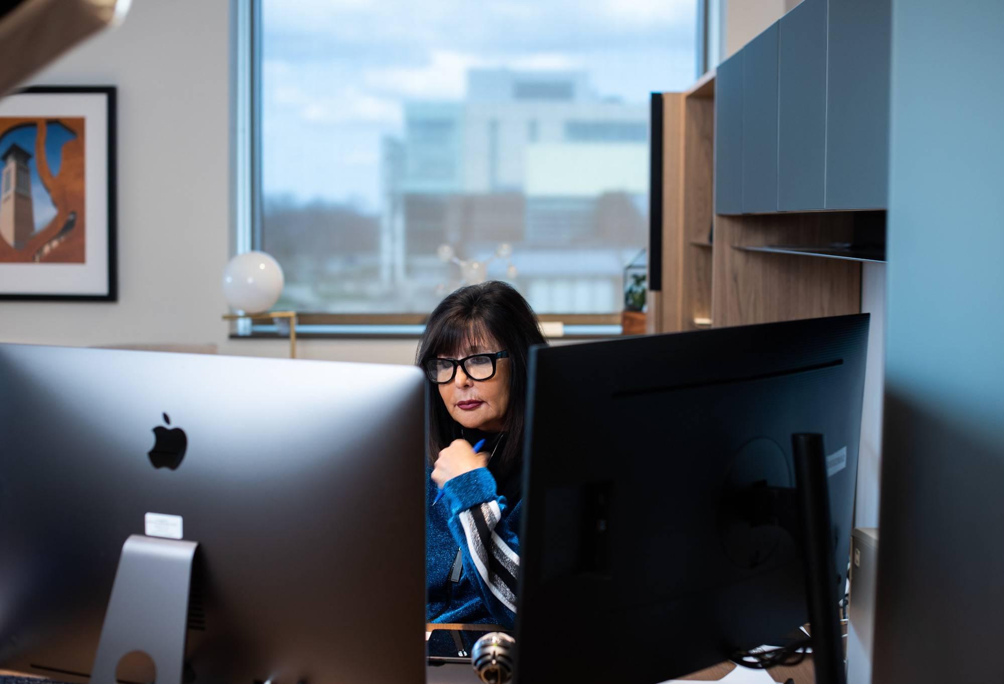 President Mantella working on her computer